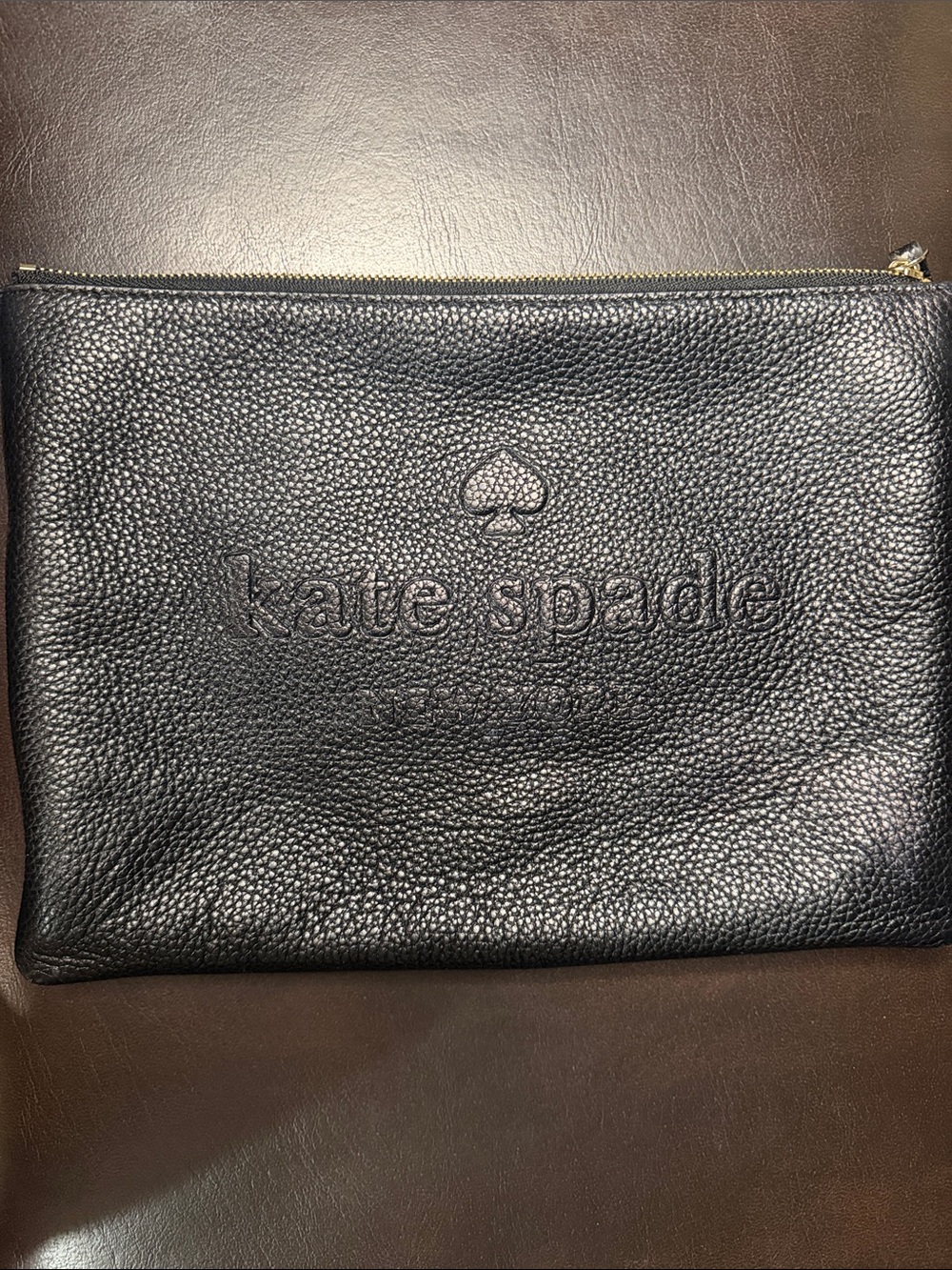 kate spade black pebbled leather toiletry pouch with embossed logo